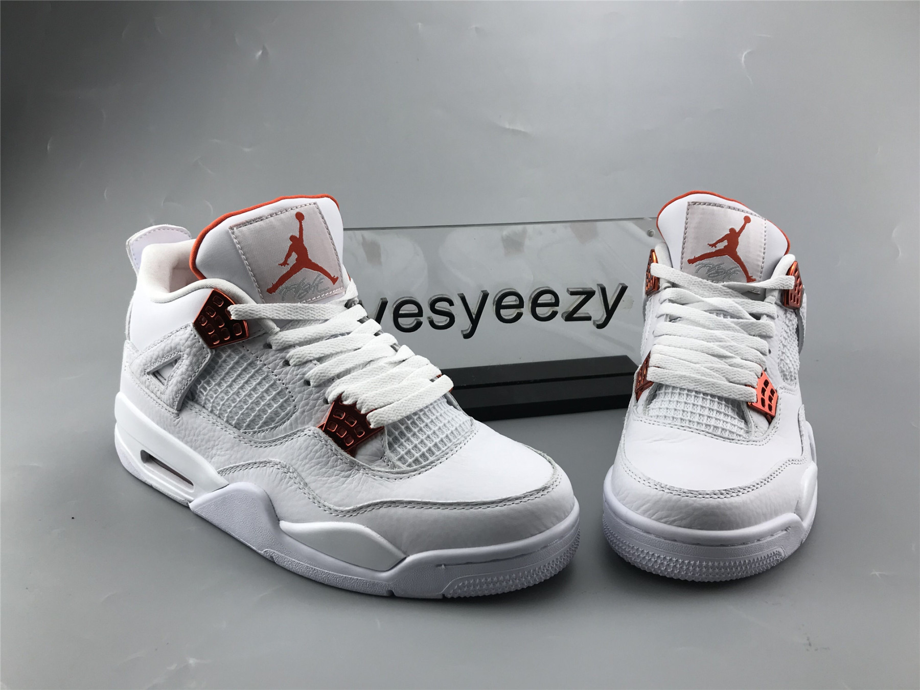 UA AIR JORDAN 4 RETRO METALLIC ORANGE