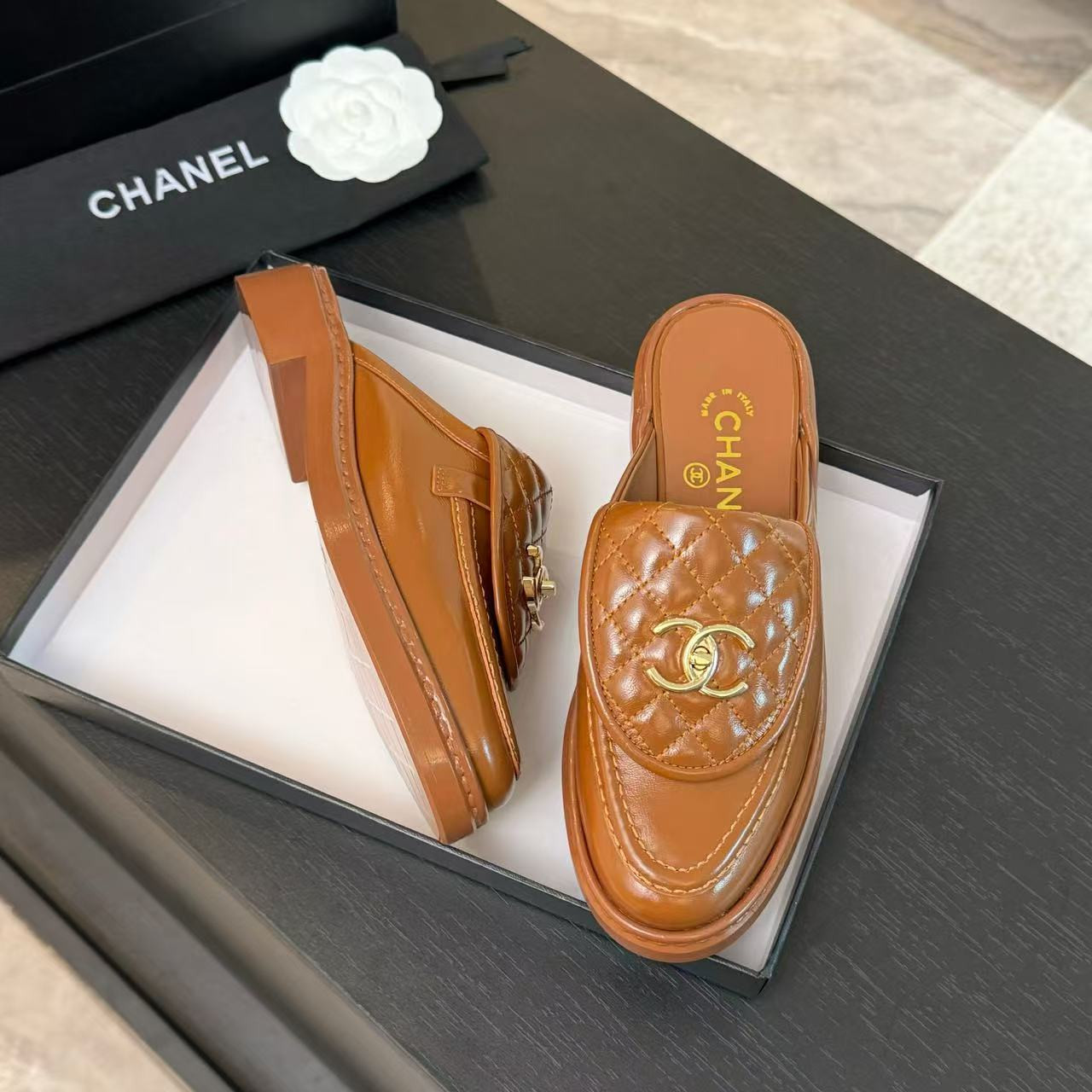 UA Ch**el Slides Leather Flats