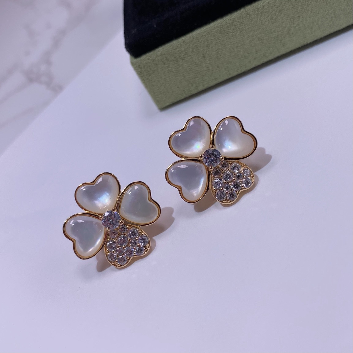 V*n Cl**f & Arpels four-leaf clover earrings