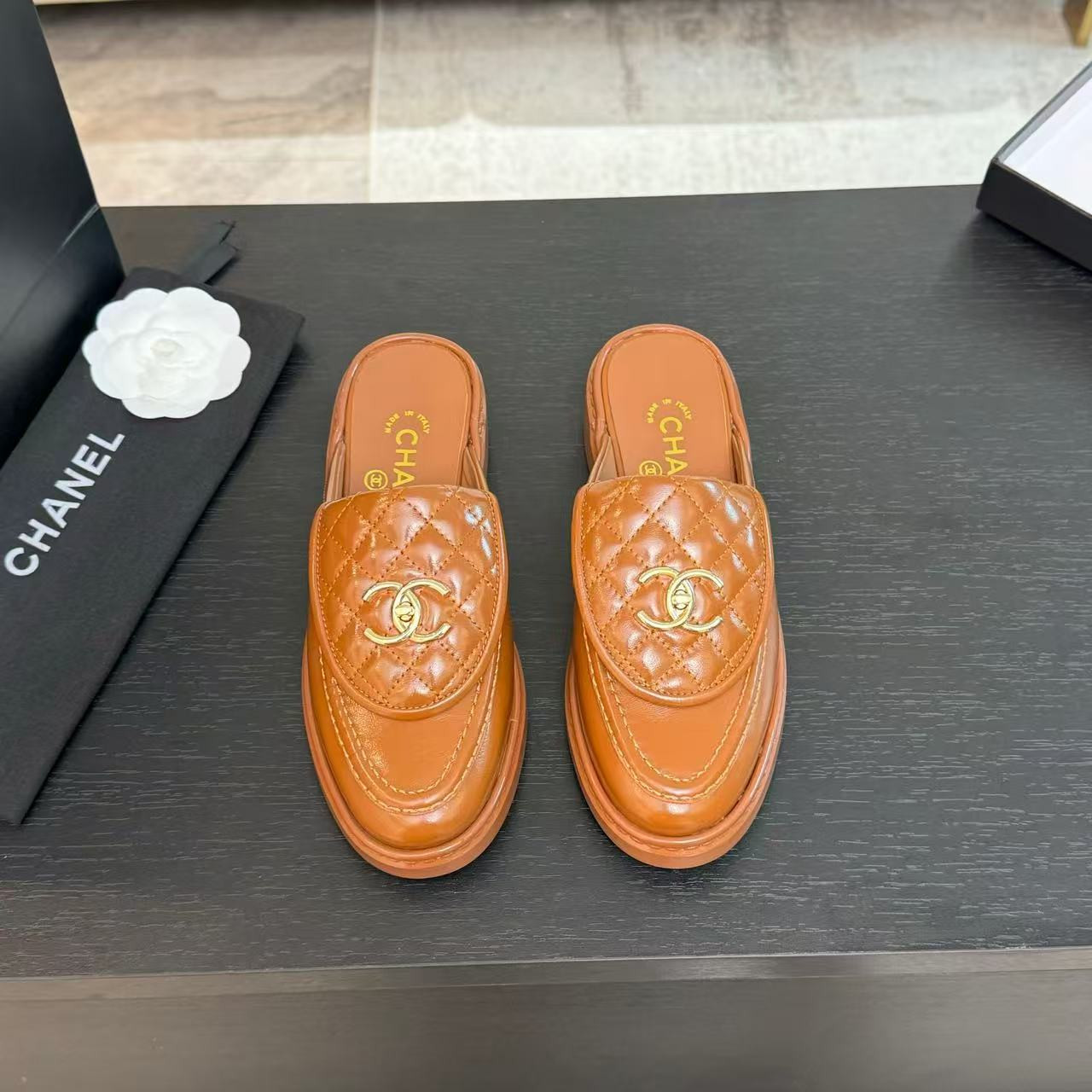 UA Ch**el Slides Leather Flats