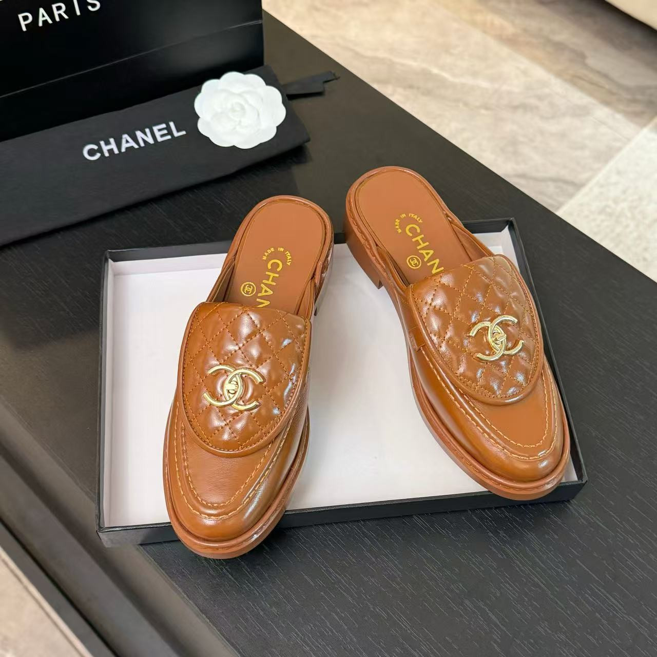 UA Ch**el Slides Leather Flats
