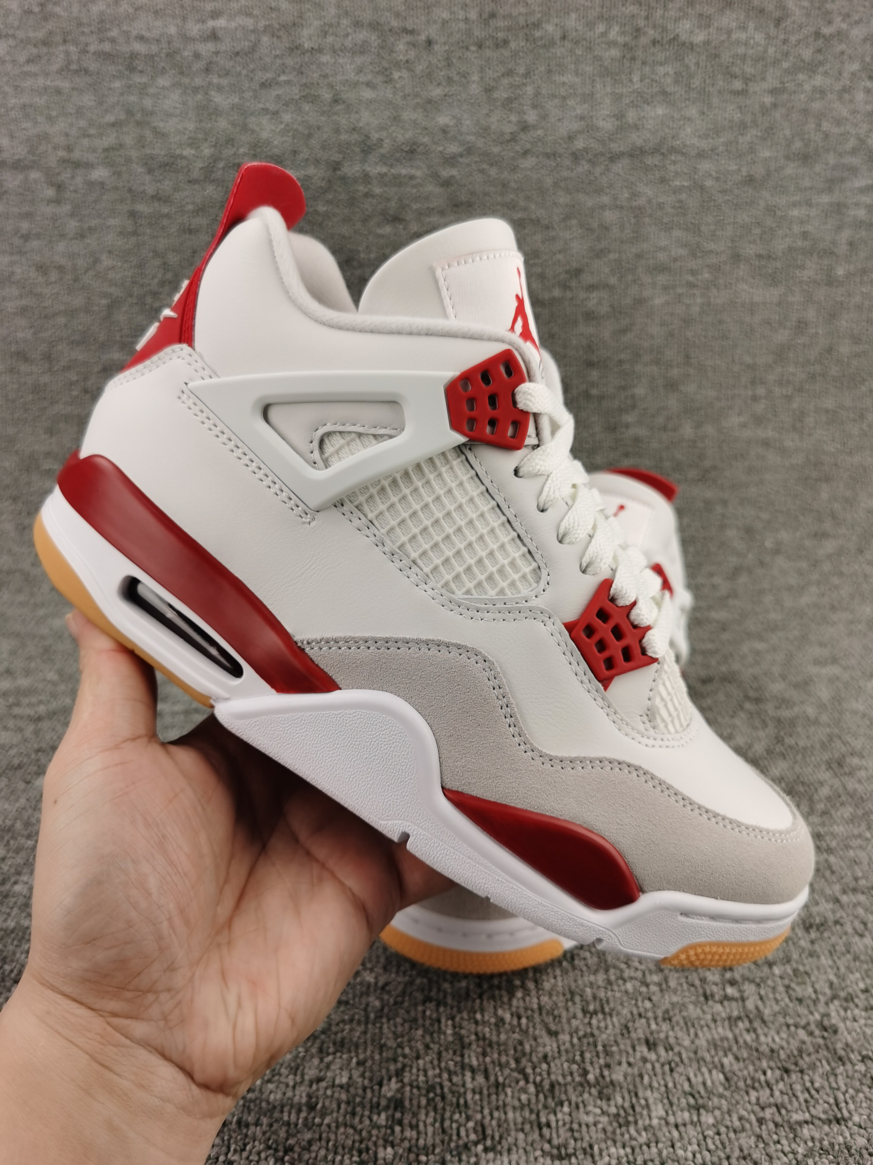 UA Jordan 4 Retro SB