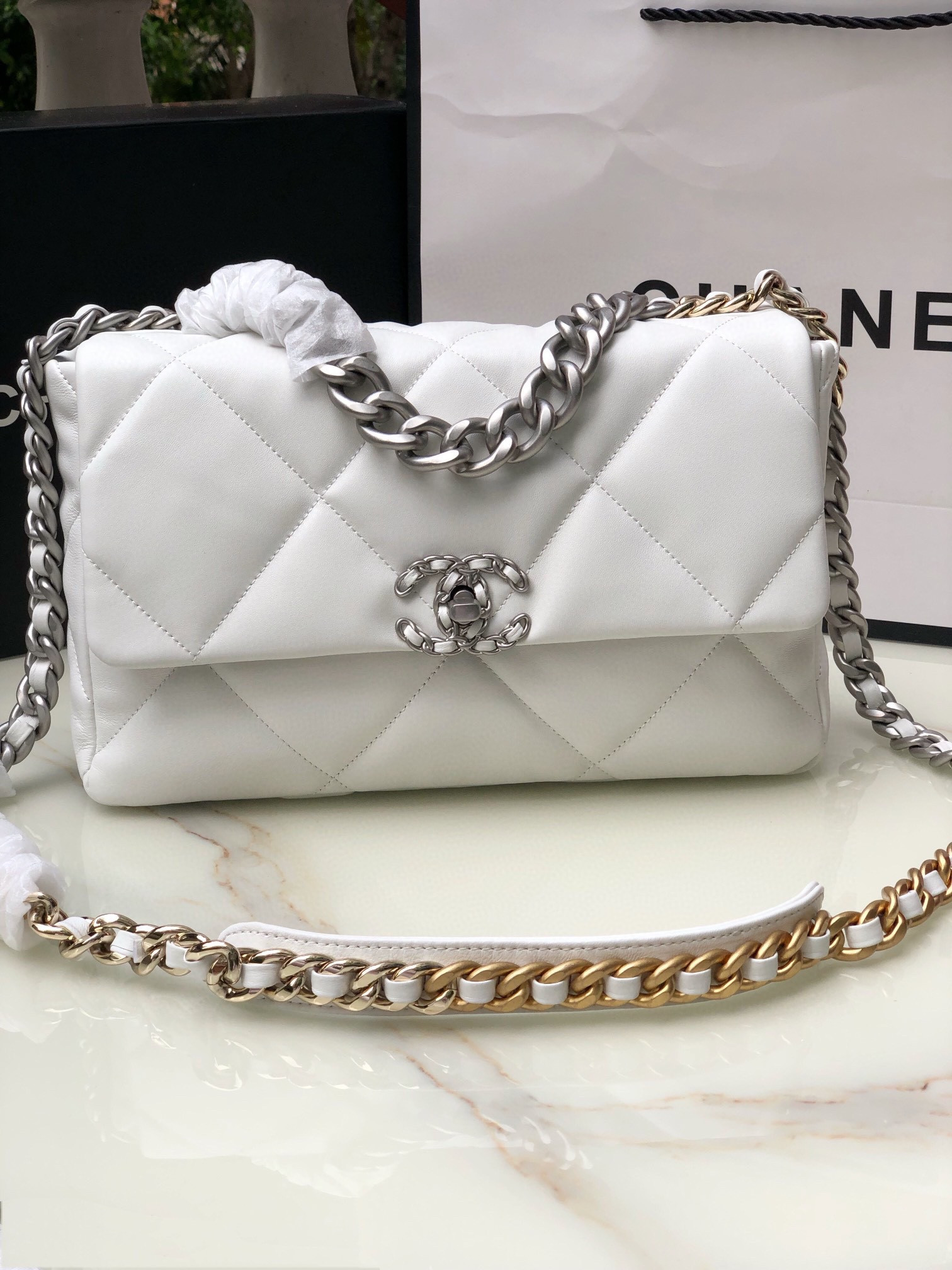 Ch**el 19 LARGE HANDBAG Shiny Leather, Gold-Tone, Silver-Tone & Ruthenium-Finish Metal White 7.8 × 11.7 × 3.9 in