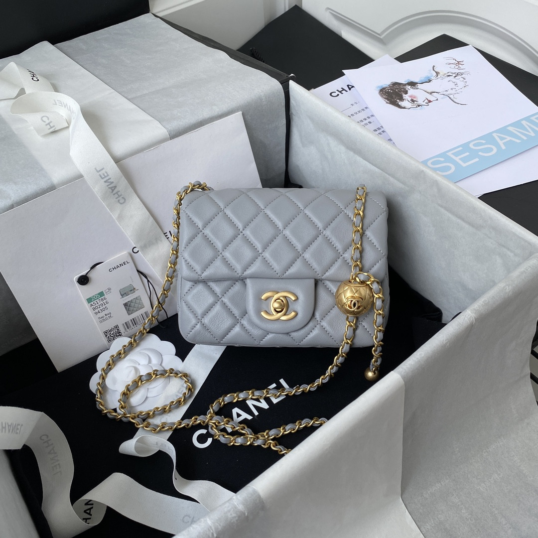 Ch**el MINI FLAP BAG SHINY CALFSKIN & Gold-Tone METAL LIGHT BLUE 5.3 × 6.6 × 3.1 in