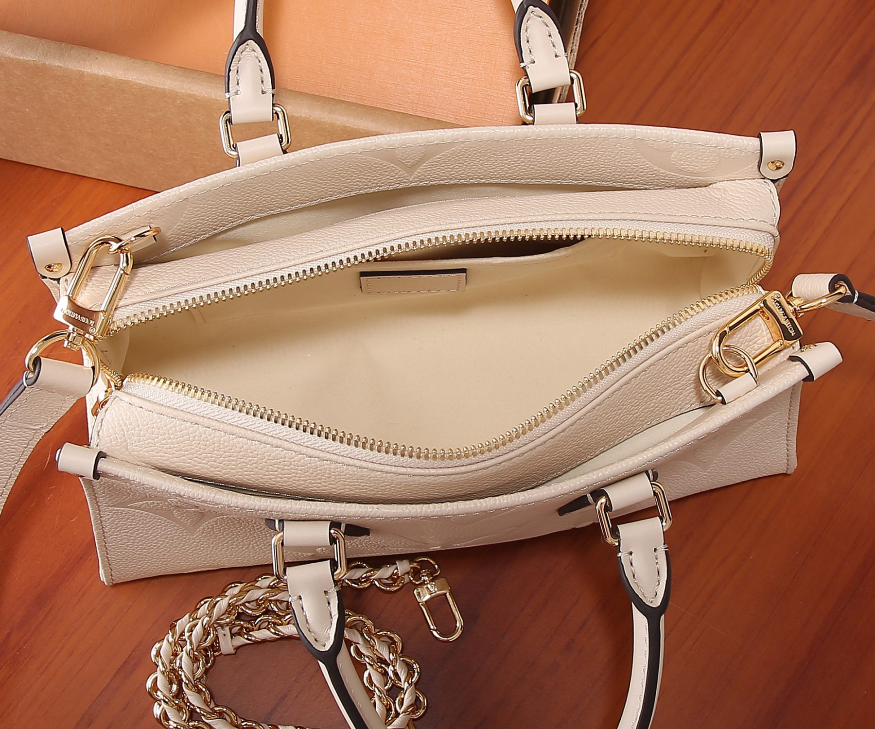 LV OnTheGo East West M23698 9.8 x 5.1 x 3.9 inches