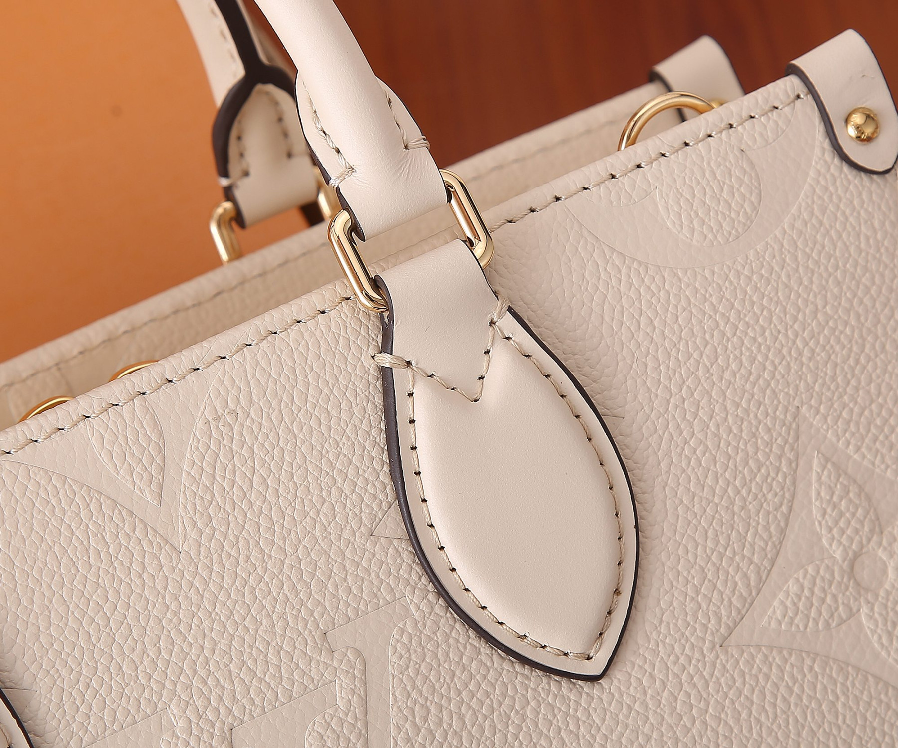 LV OnTheGo East West M23698 9.8 x 5.1 x 3.9 inches