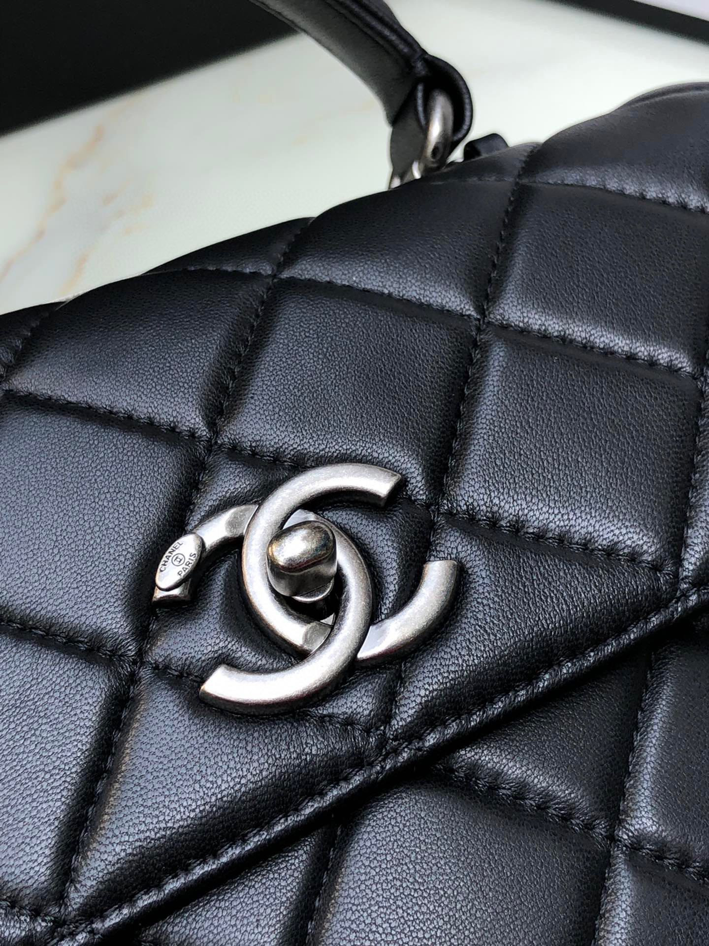 Ch**el FLAP BAG WITH TOP HANDLE 6.6 × 9.8 × 4.7 in