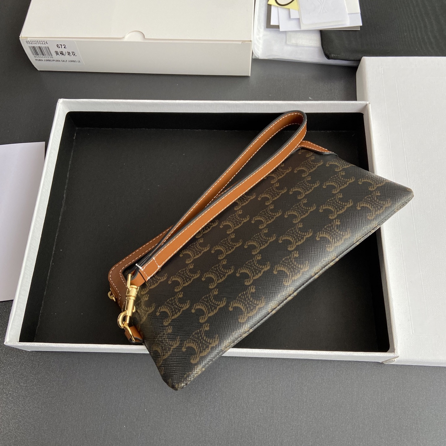Ce1i*e LONG POUCH WITH STRAP in triomphe canvas and calfskin 21.5x11.5x1cm