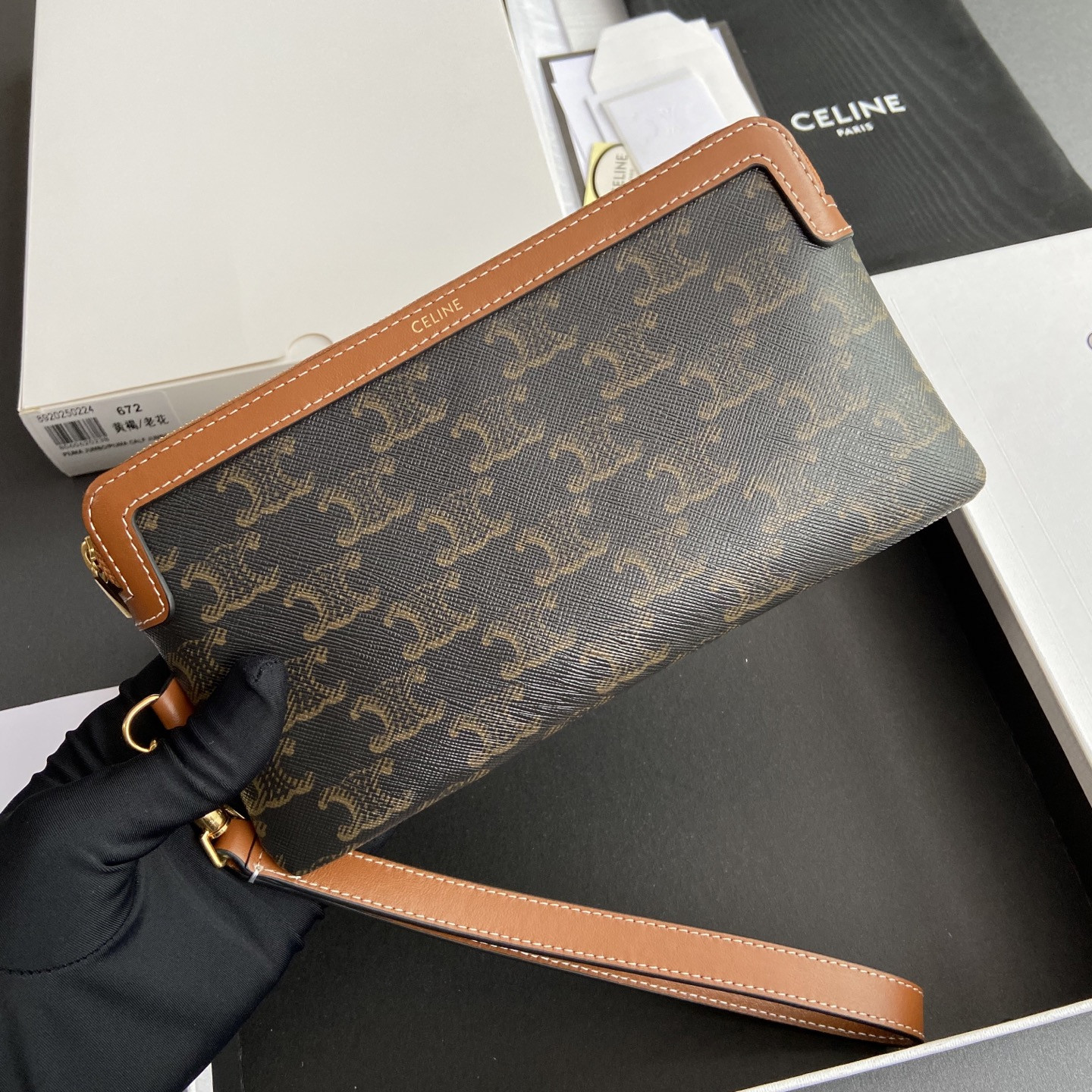 Ce1i*e LONG POUCH WITH STRAP in triomphe canvas and calfskin 21.5x11.5x1cm